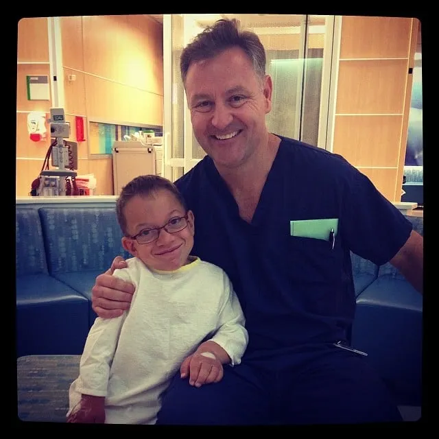 Isaac, with his (and our) favourite anesthesiologist, Dr. Cengiz Karsli. Cengiz has done all of Isaac&#x27;s anesthetics, and brings our stress level down more than he could ever know. He&#x27;s a treasure at this hospital, and I&#x27;m thankful that out son is under his care.