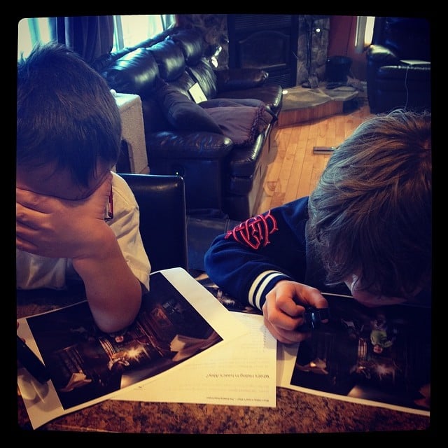 Isaac and Gabriel looking for the hidden gems in their Drawing Hope photo!