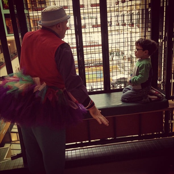 Isaac's favourite clown @Sickkids, A. Leboo,  is making animal sounds throughout the hospital atrium. Confused people down there, but hilarity with Isaac and Gabe! #precious