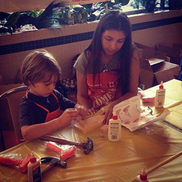 Gabriel, building a Sail Boat at Sick Kids.